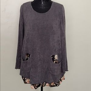 Gray sweater with floral accents